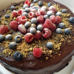 berries on rich chocolate cake